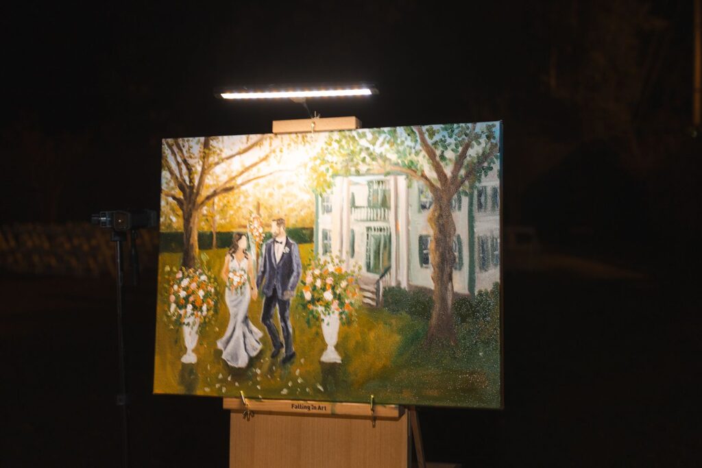 Painting of bride and groom done by live painter at wedding.