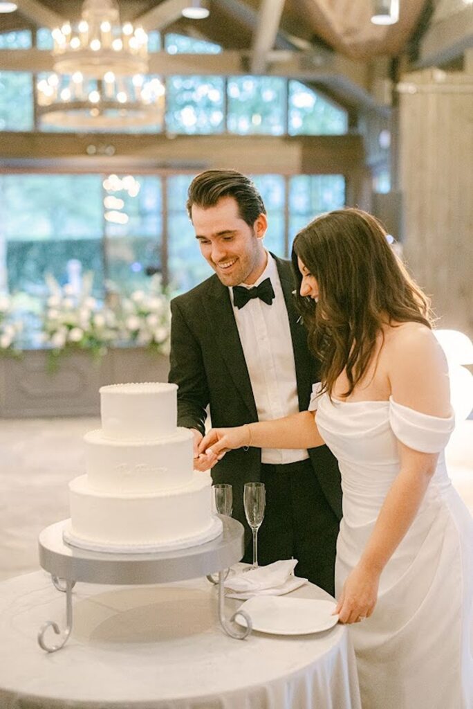 Bride and Groom cutting their wedding cake