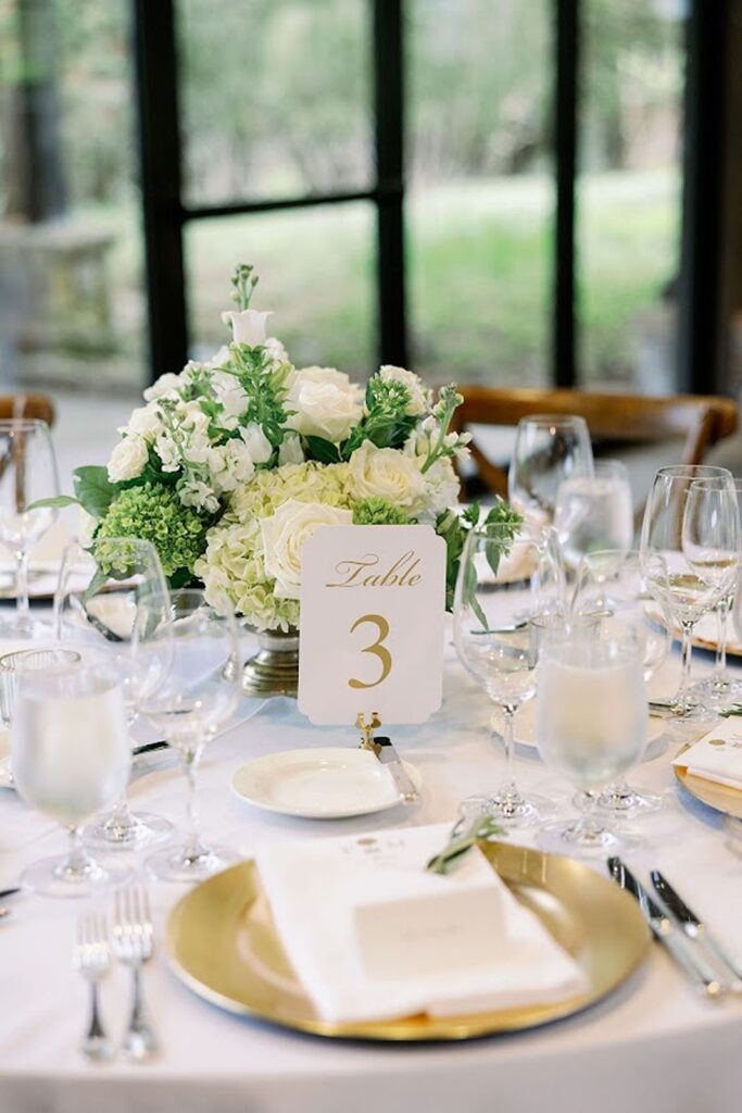 Table Three set and decorated with floral elements at wedding