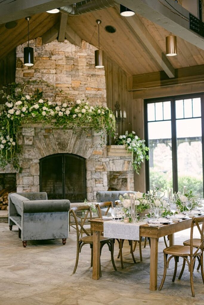 Decorated table setting with fireplace decorated with florals