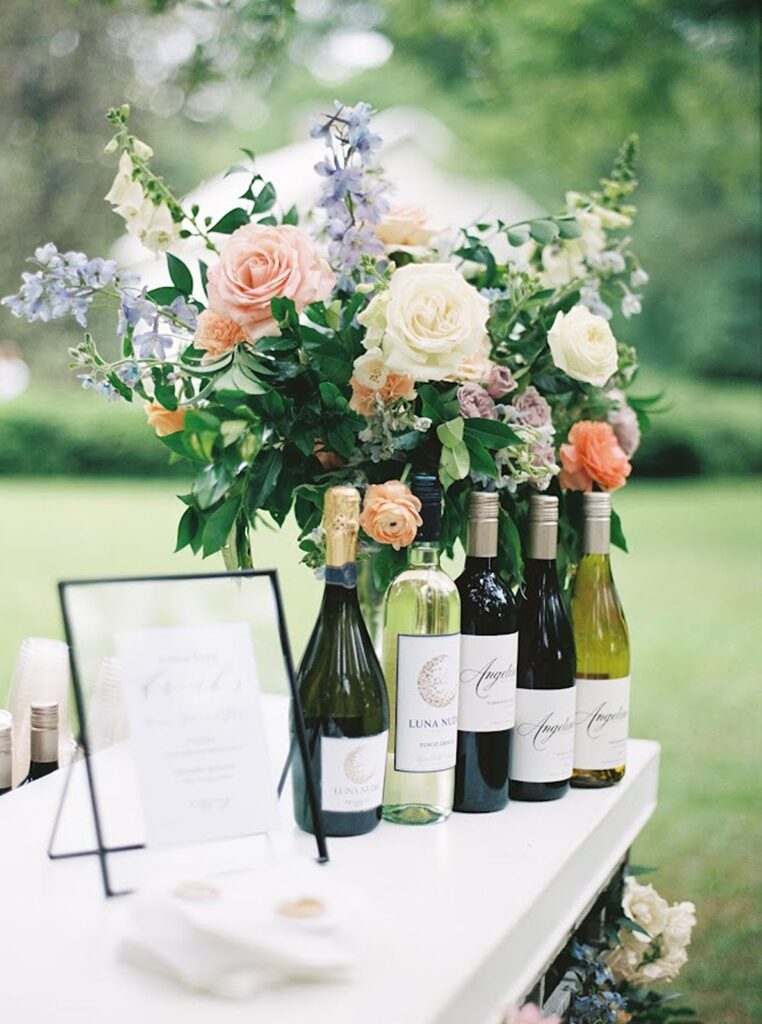 Wine selection in front of floral selection