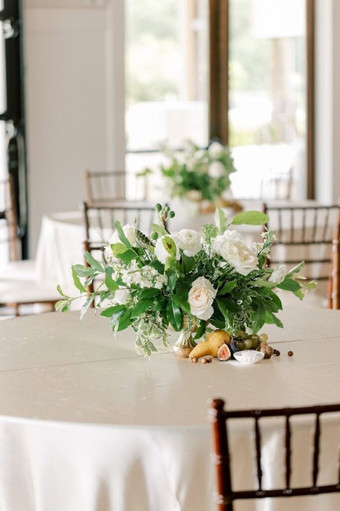 Floral detail on reception table for wedding