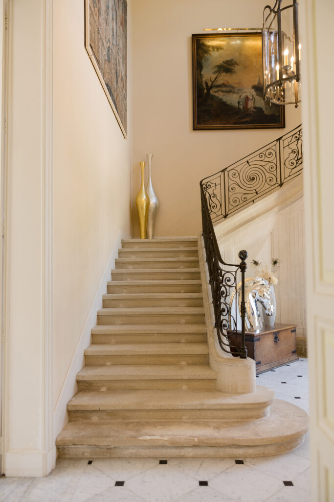 stunning stone staircase inside Chateau de Tourreau
