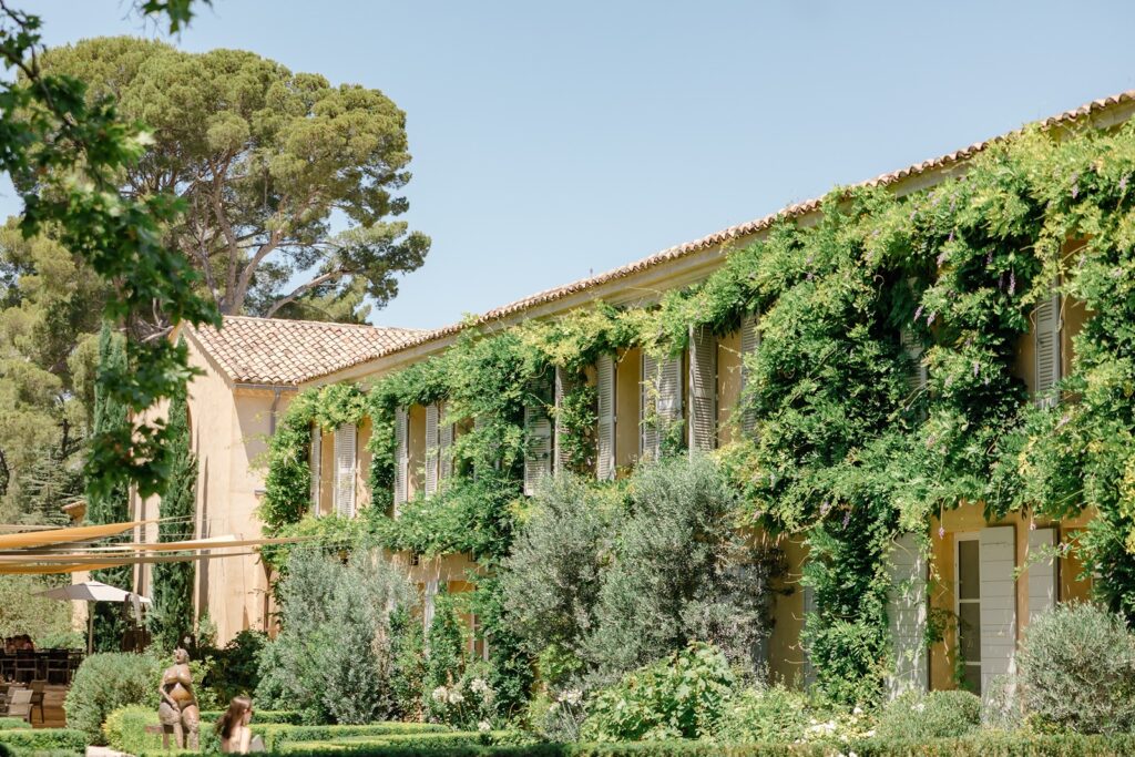 A house dressed in ivy, breathing life into stone