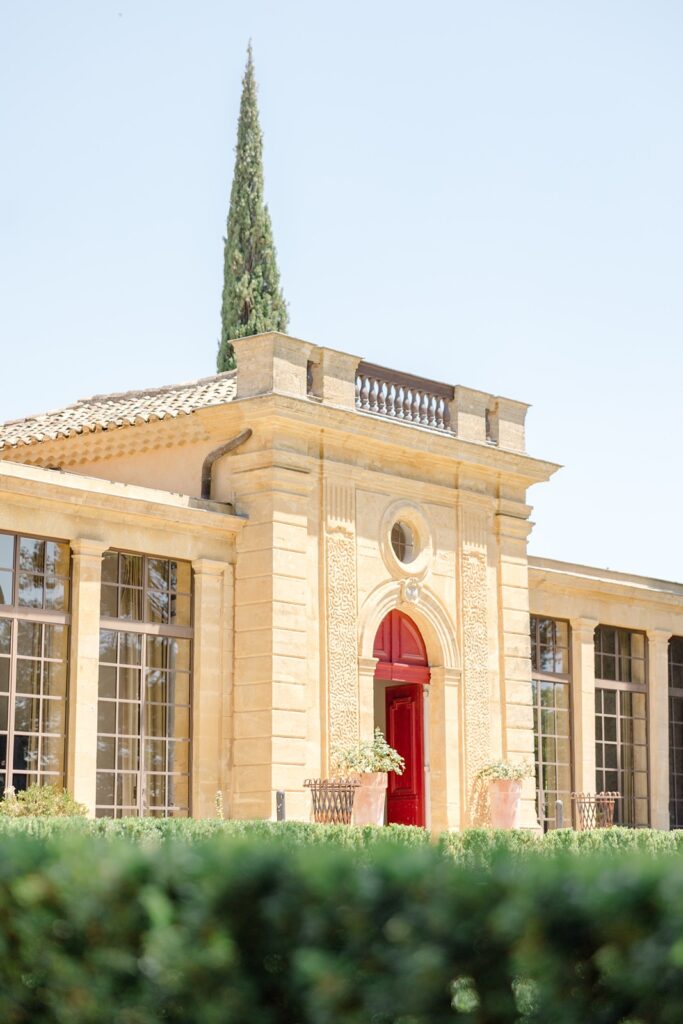 simple, bold features like red doors make the building breathtaking 