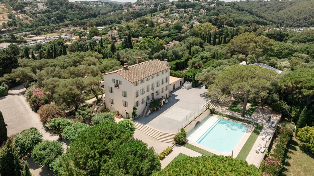 Aerial view of Bastide du Roy surrounded by olive groves